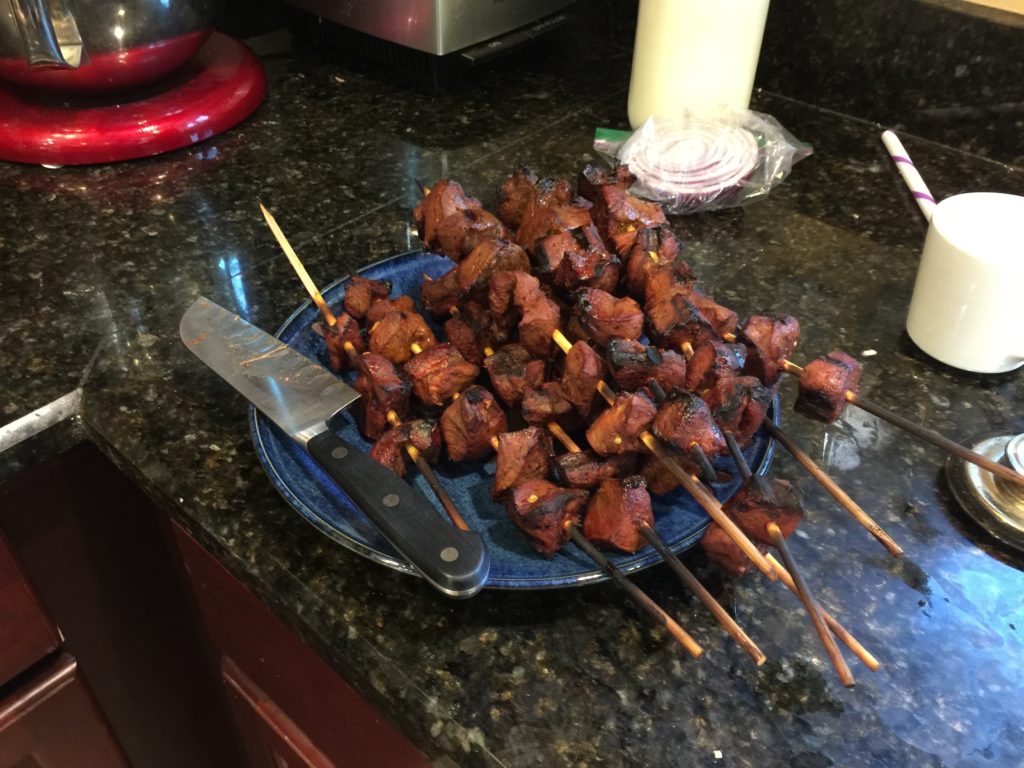 A plate of freshly cooked moose heart kababs