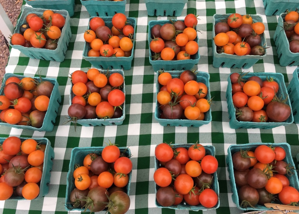 baby tomatoes orange and dark red