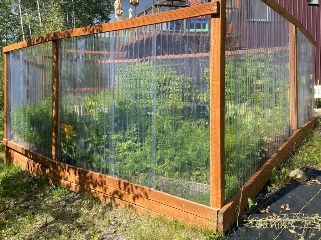 fence made with greenhouse plastic